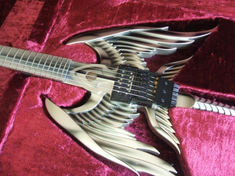 Illustration for article titled Angel Sword Guitar Plays Iron Maiden Songs, Slays Teen Pop Stars